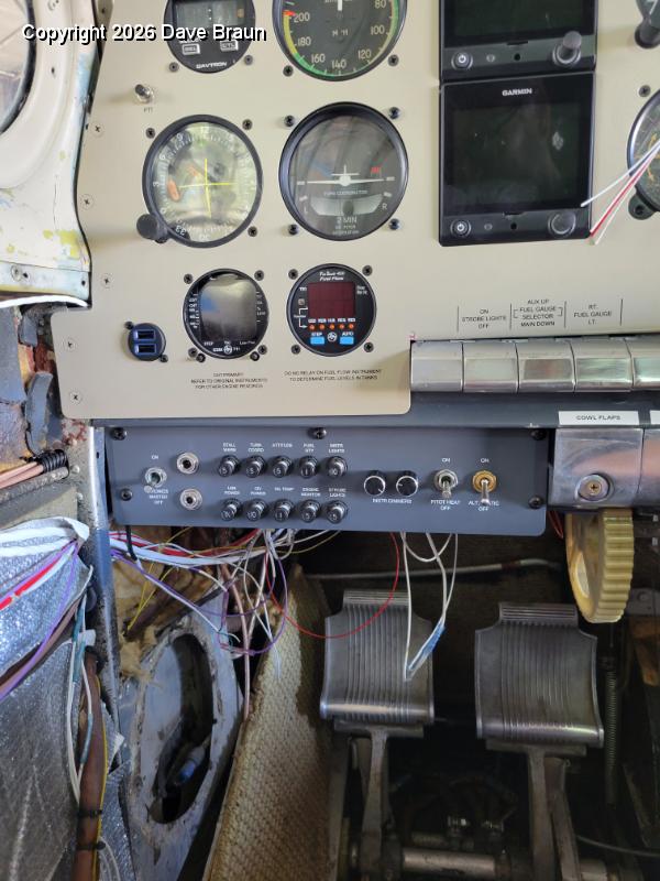 2024-11-15 13.14.40.jpg - Fitting the left hand circuit breaker panel.