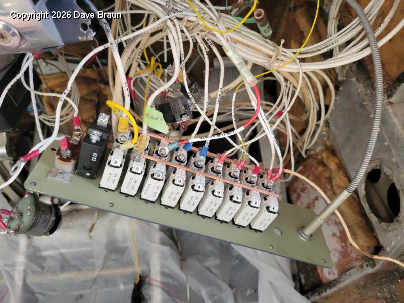 2024-04-07 19.18.09.jpg - On going progress on RH breaker panel. The Yellow cable ties the lower bus to the breaker above, because the rest of the upper bus is the avionics bus.
