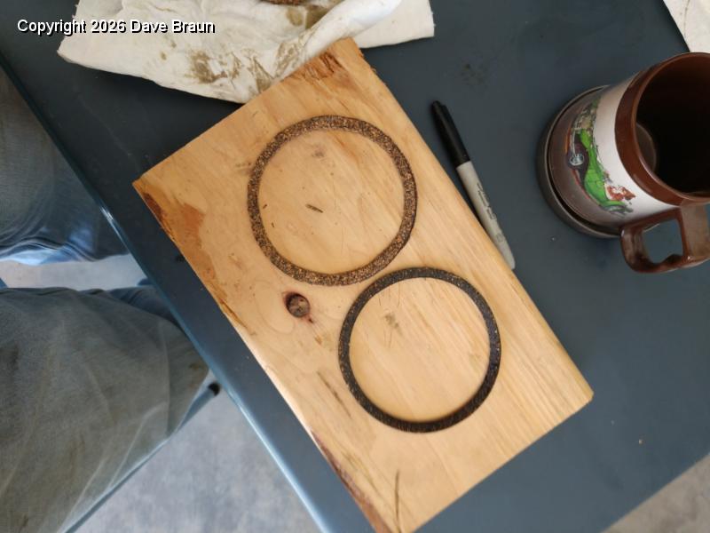 Airwolf Air Oil Sep cut new gasket.jpg - The original gasket had shrunk, causing a loosening of the top and bottom can halves, and a leak path to the outside. Our massive oil leak may have been found! So I fabricated a new gasket of identical thickness (top).