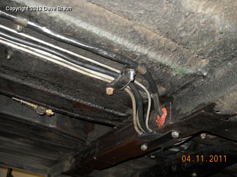 Brake line routing to rear cleaned up new rubber 01.jpg