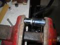 Pressing in bar link bearing