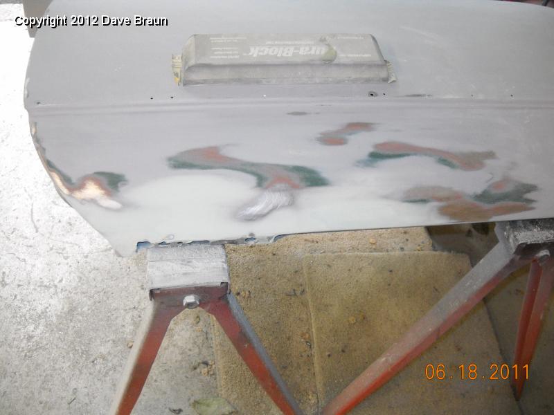 Fill on door prior to sealer.jpg - Additional effort was put into the RH door panel at the site of the crack of doom. Eventually a fnal coat of light filler was placed to level the entire surface, much better than from the factory.
