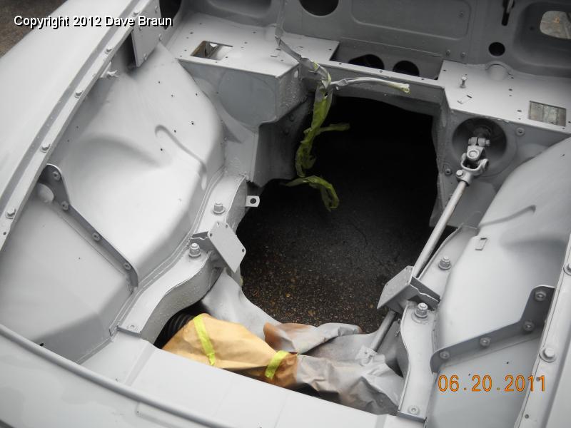 Hand block sanding the engine bay.jpg