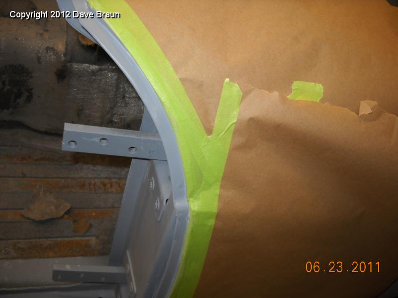Masking paper along taped edge.jpg - Then, masking paper is taped in place.