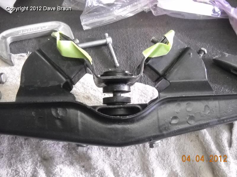 Ready to install xrews taped in place for convenience.jpg - If I had this to do over, I would try it with the butterfly bolted to the gearbox via the mounts, and then lever the cross member into place against the stiffness of the mounts.