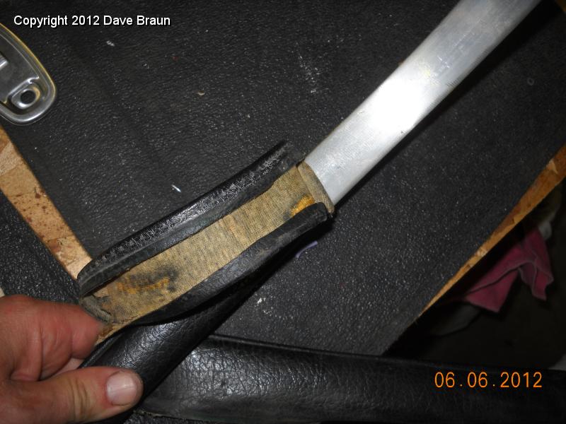 Removing black vinyl from rear cockpit trim.jpg