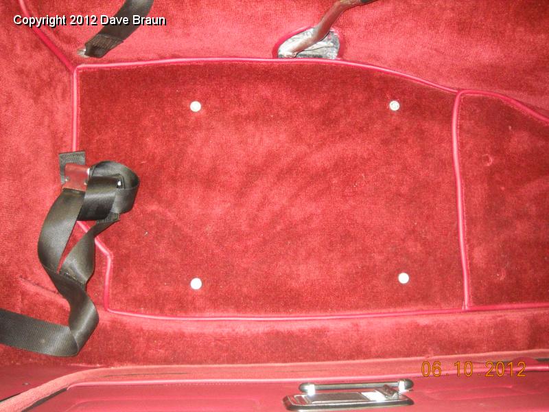 Seat bolts and spacers installed to mark carpet.jpg