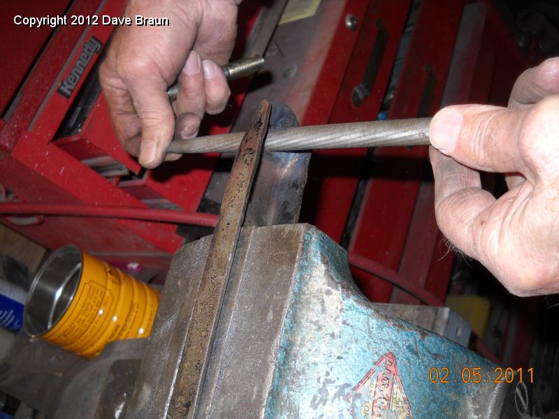 Filing weld material to make round hole.jpg