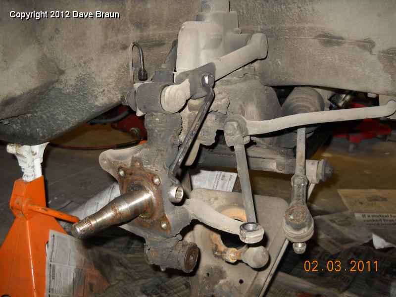 Loosening Shock Arm bolts.jpg