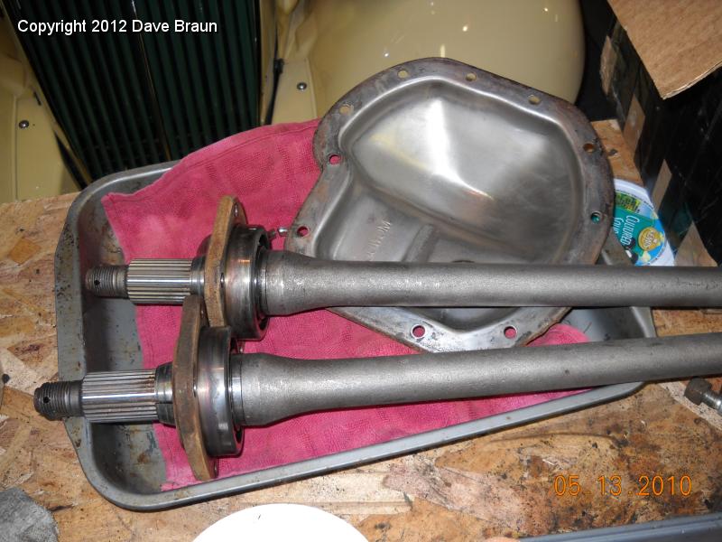 Wire wheel axle shafts with old bearings.jpg