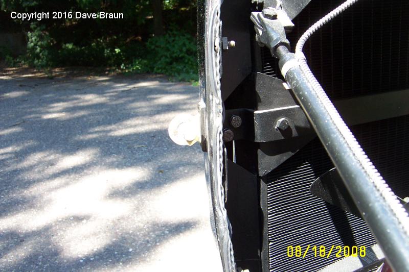 Installed bracket supports.jpg - Installed front light stay brackets. I elected to paint these body color rather than re-chrome them.