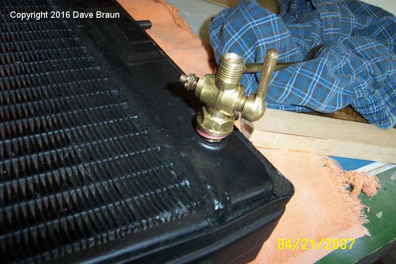 Drain stops at wrong position.jpg - Tightening the drain tap. Tightening the drain tap revealed that the fiber washer was the wrong thickness to allow the drain to be oriented correctly.