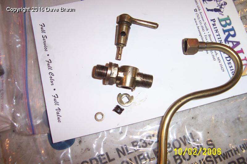 Rad tap exploded view flash.JPG - Exploded view of tap. I did tear down in a plastic bag this time to keep from losing the spring or other parts. I originally tore apart the one with the broken handle thinking I would repair the handle. Of course, I lost the spring in the process.