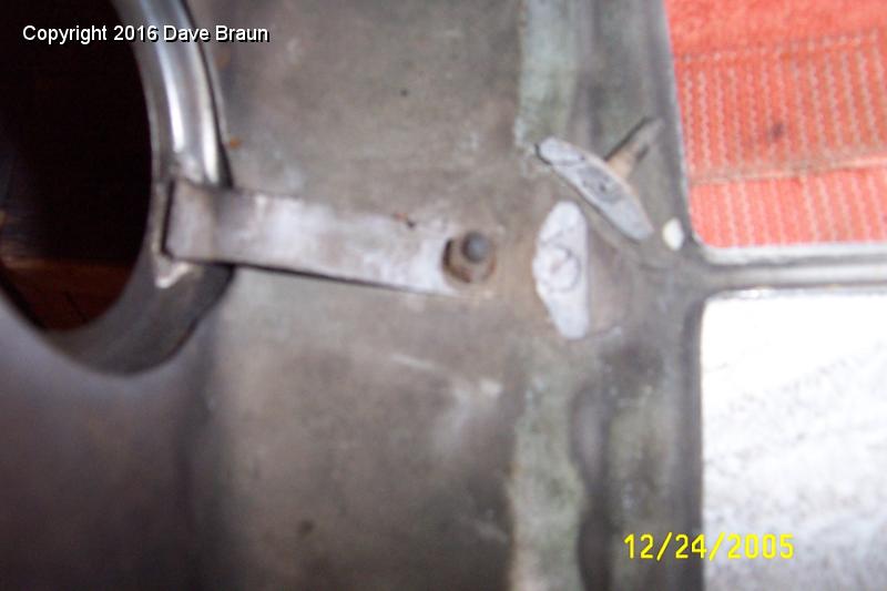 broken stud center top shell.JPG - Broken center top stud for grill slats. False nose clamp and stud from emblem is also visible.