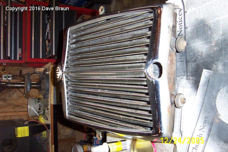 rad and shell front.JPG - The shell, grille and radiator. The mounts are on the radiator for safe keeping for now. I probably knew at this point that I was going to strip the grille, but I was unsure of the cost and difficulty in stripping and rechroming the shell. I had heard so many expensive stories.