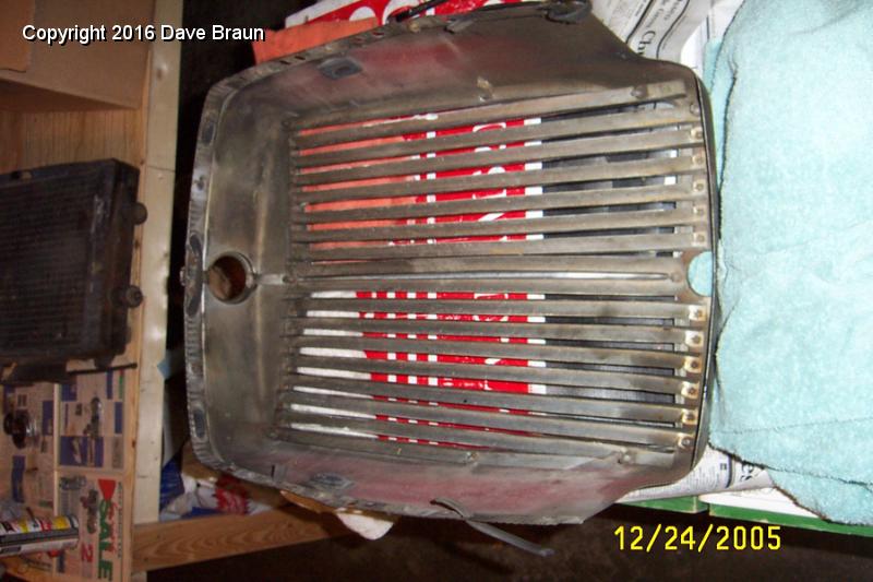 shell and slats back side.JPG - First step in removing the slats, flip the shell over. The slats are set in a complicated fashion.