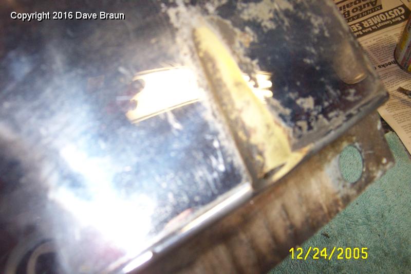 wear thru on lower shell RHS.JPG - The worst damage to the shell. This is prior to stripping.
