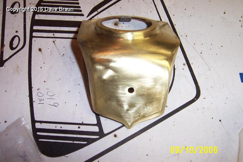 false nose working out the dents and smoothing.JPG - Nose piece after first polish. Trying to smooth out the front surface. I may have done more damage to the piece than repair trying to work with it. But it's mine, and when I look at it, I'll remember how hard this is for me, and how talented some people are.