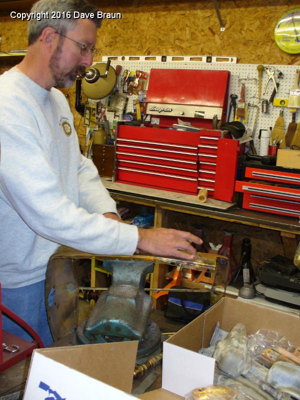 shell Dave sanding.JPG - Sanding the shell, by hand. It turns out that I am really, really  terrible at using the buffing wheels and sanding belt.
