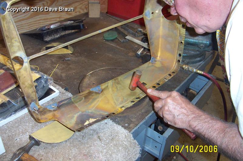 working out dents in shell.JPG - Dinging out a low spot.