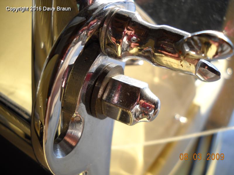 Windscreen lock nuts 02.jpg - My original dome nut with the spacer with the 'D' opening to fit the flattened side of the pivot threads.