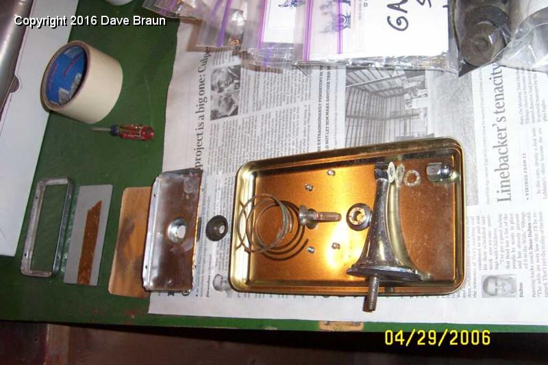 disassembled replacement mirror.jpg - Mirror disassembled. The mirror needs rechroming. So I tore it apart for stripping. I don't care for the replacement mirrors.