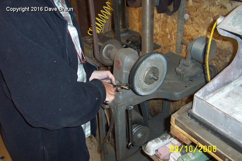 polishing windscreen stanchions.JPG - Polishing windscreen stanchions. Getting ready to go to the chrome shop.