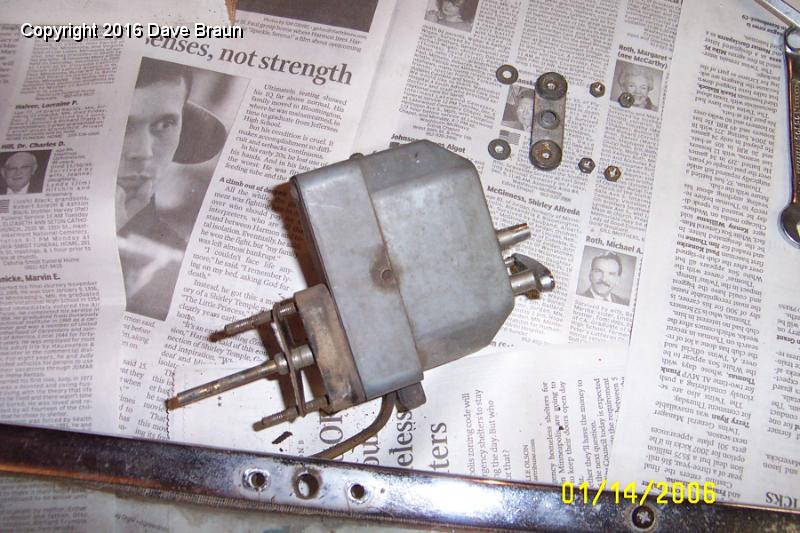 wiper mount hardware 2.JPG - The wiper motor I've never seen run. Of course, I broke the phenolic block into six pieces removing the shaft and the two bolts. But now I know how to get it apart. Epoxy is a wonderful material. More about that...